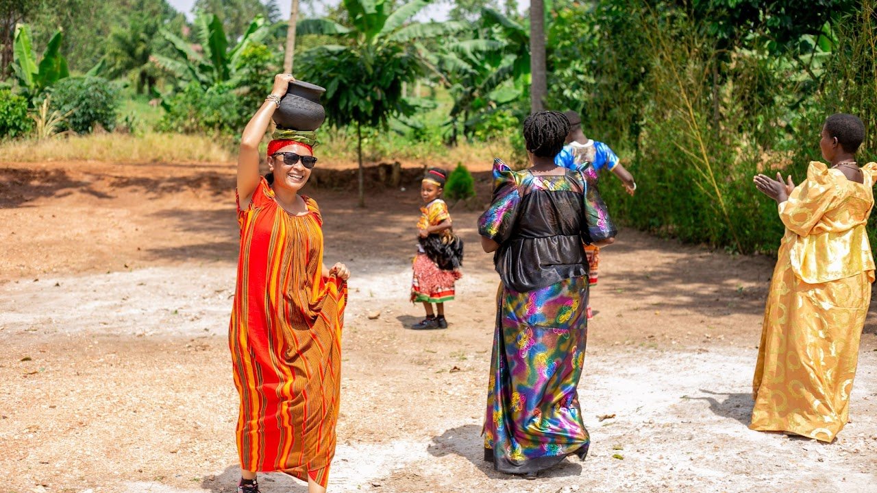 Fetching water at Ewaffe Cultural Village Mukono